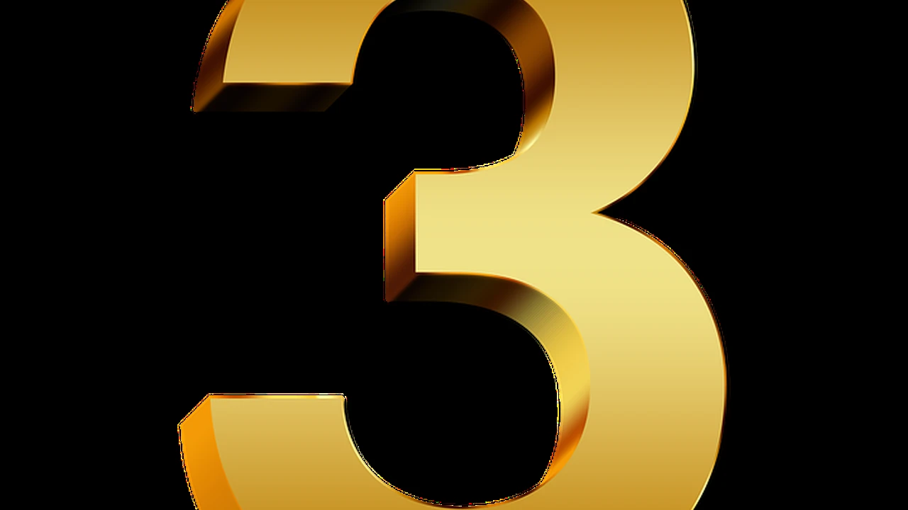 overhead view of corned beef sliced and on a platter with cabbage, potatoes, and carrots