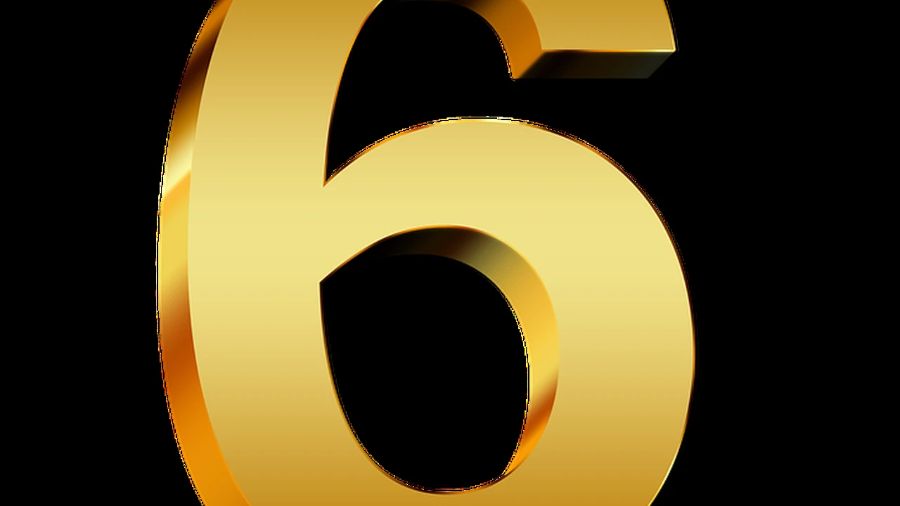 overhead view of corned beef sliced and on a platter with cabbage, potatoes, and carrots