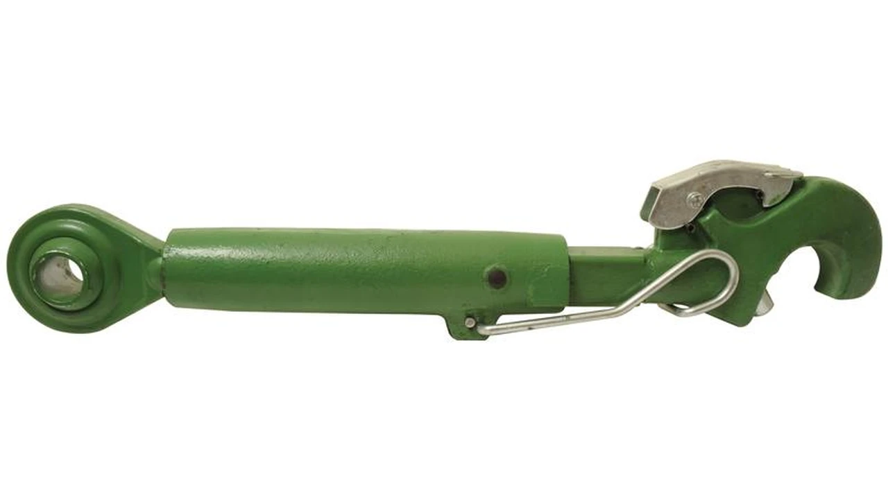 blue bowl of black bean beef tortilla soup on a board with cilantro and shredded cheese in background