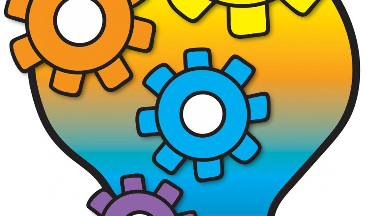 Close up on a plate of mashed potatoes, topped with baked pork chops with cream of mushroom soup, and a side of green beans.